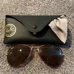 Ray ban (not polarized) sunglasses. Used. Case and cloth cleaner included